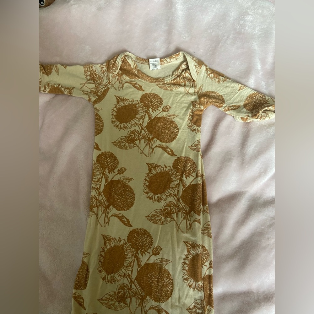 Kate Quinn knotted gown. Sunflower print